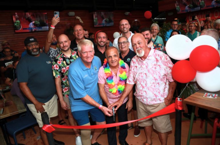 Ribbon cutting ceremony of Pride Hub at the Pub on August 16. Photo by JR Davis.