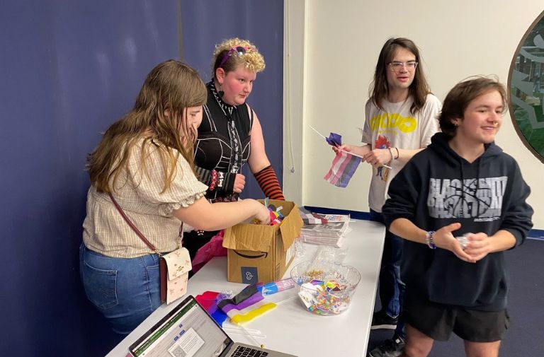 Lavender Alliance handing out swag. Photo by Jason Steinfeld.
