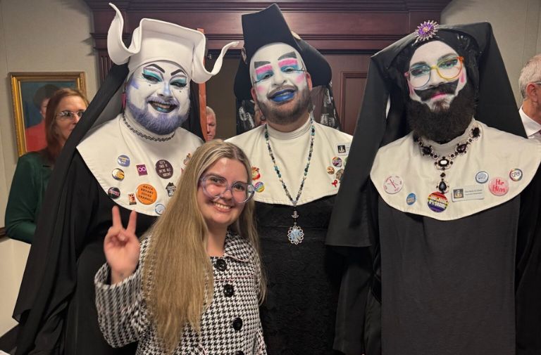 Mary Rasura posing with the Sisters of Perpetual Indulgence. Photo courtesy of Rasura.